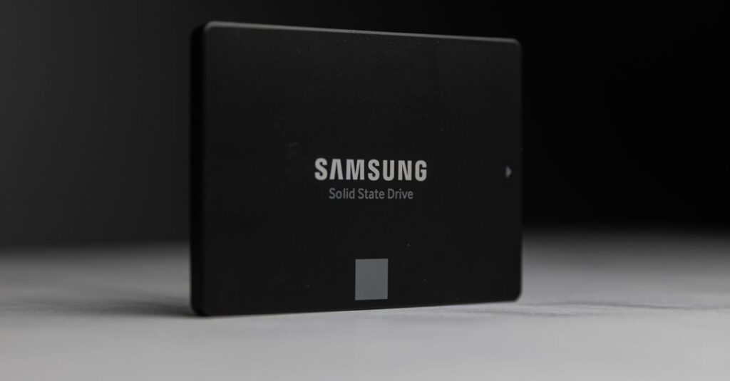 Close-up of a Samsung solid-state drive on a dark surface, modern technology.