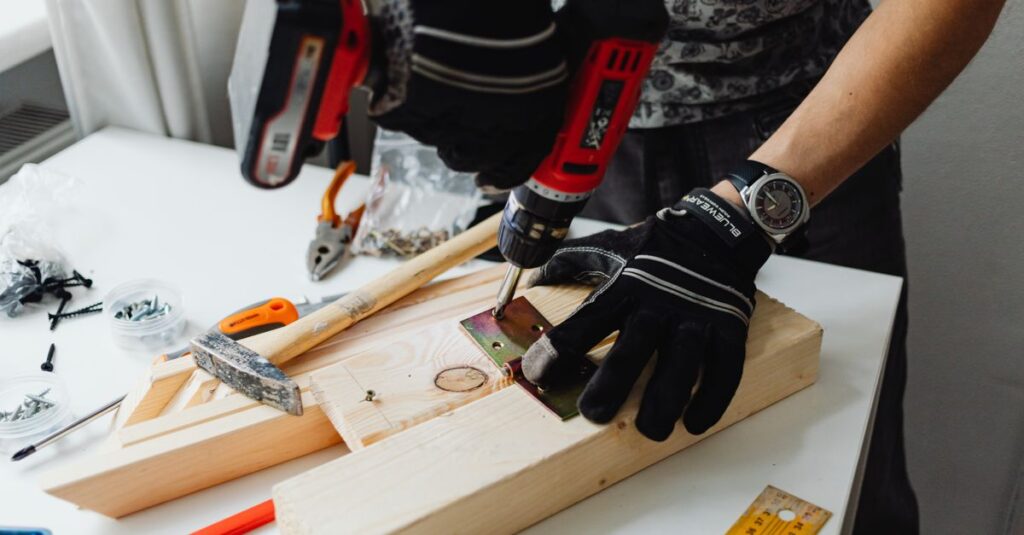 A craftsman uses a power drill on wood, showcasing carpentry tools and skills.